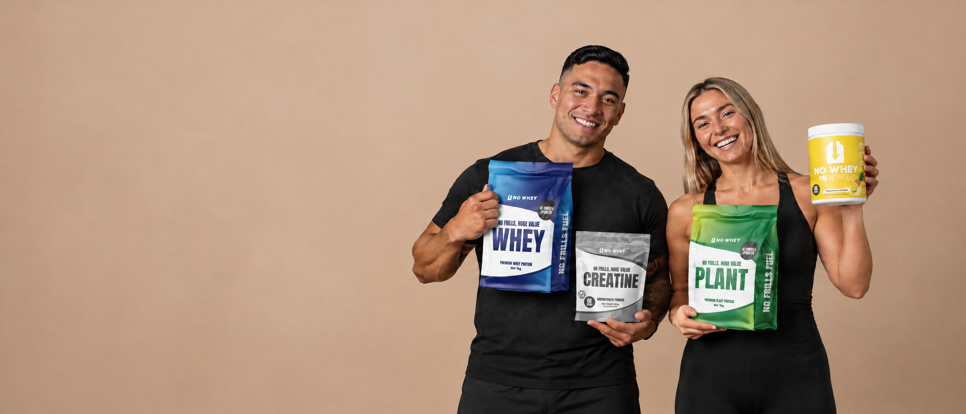 Two athletes holding NoWhey Whey, Creatine and Plant protein bags